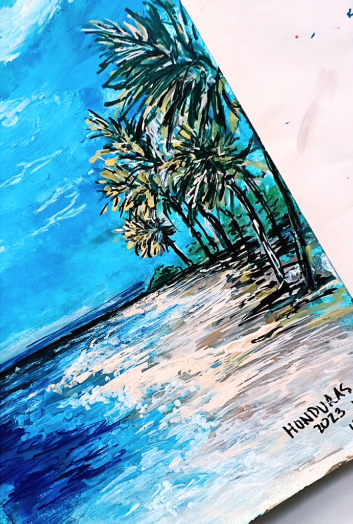 painting on vacation while looking at the honduras crystal blue oceans